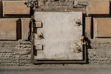 rusty white metal door