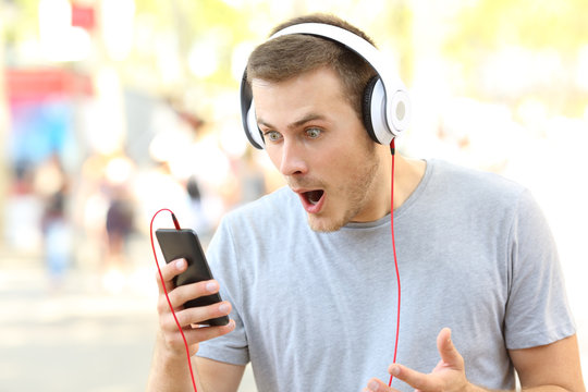 Surprised guy receiving shocking news