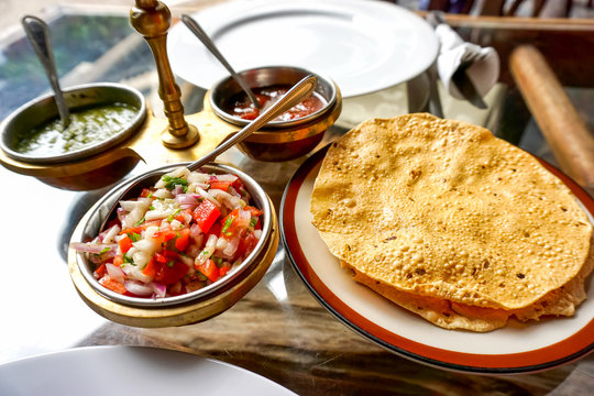Papad, indian traditional food served with garnish