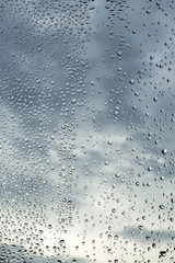 Rain / Water drop of rain on glass with outdoor background