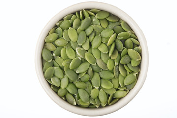 Shelled pumpkin seeds in a pot