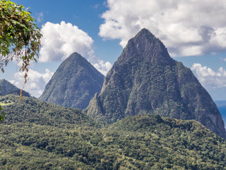 The Piton Mountains, St Lucia. The Pitons ("Peaks" in French) are two mountains, formed from volcanic plugs, above the town of Soufriere. They are the most famous landmark in St. Lucia. 