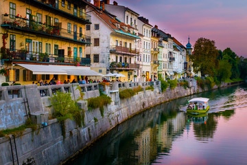 Panorama of old town Ljubljana, Slovenia, with Ljubljanica river in sunset