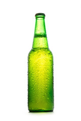 Green light beer bottle with water drops