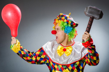 Funny clown in comical concept