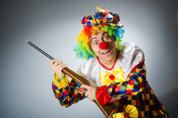 Funny clown in comical concept