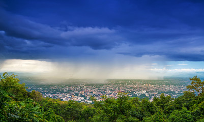 Dark storm clouds are moving at Doi Suthep view point at Chiang mai on top of mountain in Thailand.