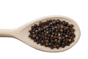 Black peppercorns on wooden spoon isolated on white.