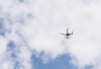 Fototapeta na wymiar Hovering drone taking pictures