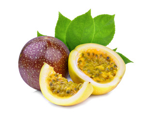 passion fruit with green leaves isolated on white background
