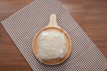 sticky rice served on wood plate