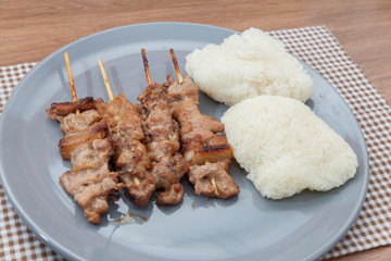 grilled pork skewer chop with sticky rice