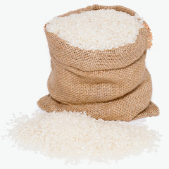 White rice in burlap sack bag isolated on white background