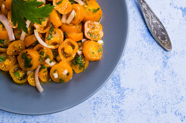 Salad of yellow tomato