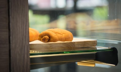 Bread In the cabinet.