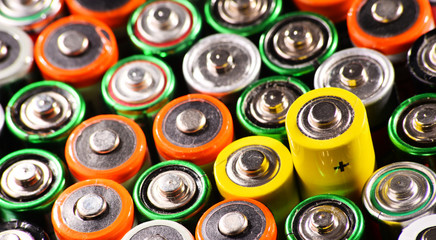 Composition with alkaline batteries. Chemical waste