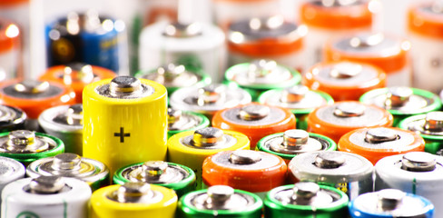 Composition with alkaline batteries. Chemical waste