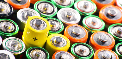Composition with alkaline batteries. Chemical waste