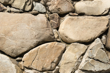 Big and brown stones on a wall