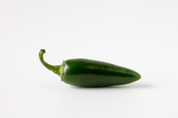 Green Jalapeno chili pepper isolated on white background