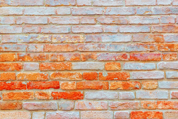Texture of a brick wall made from an old red bricks. Picture taken in Venice.