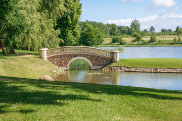 Old park with bridge and island.