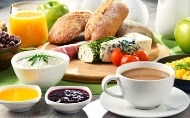 Breakfast served with coffee, cheese, cereals and scrambled eggs