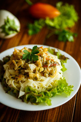 Boiled home-made noodles with gravy from eggplant
