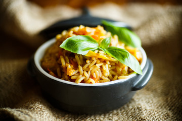Pilaf with beef, carrots, onions, garlic, pepper and cumin.
