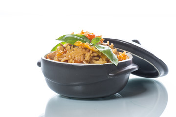Pilaf with beef, carrots, onions, garlic, pepper and cumin.