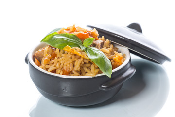 Pilaf with beef, carrots, onions, garlic, pepper and cumin.