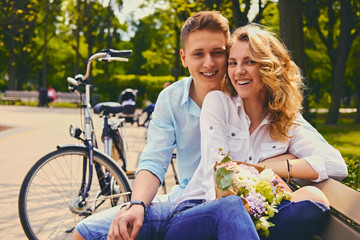 A couple on a dating in a summer park.