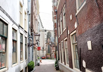 Foto auf Alu-Dibond Amsterdam, Holland, Europe - view of an alley in the city center © tanialerro