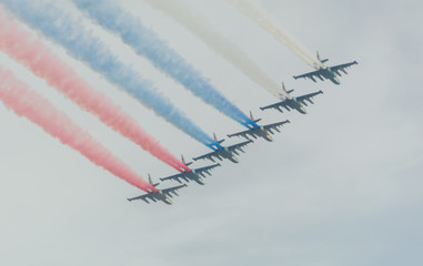 Russia, Saint-Petersburg, July 30, 2017, in celebration of the Navy, the flight of aircraft made out of the smoke a Russian flag over the city.