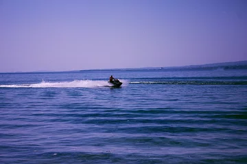 Foto op Canvas Young Man on Jet Ski © S...