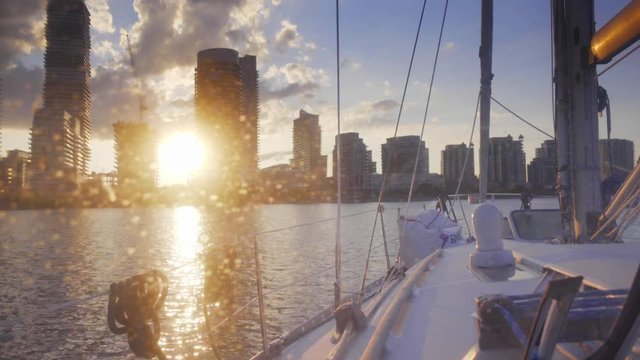sailboat in summer on the lake ontario toronto sunset