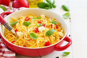 Gluten-free pasta with tomato sauce and cheese.