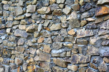 Obraz premium sample of a decorative fence made from raw natural stone