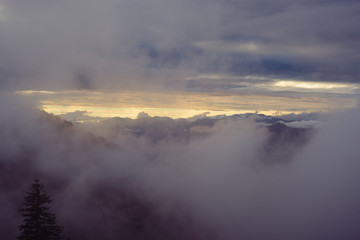 Purple sunset in a mountains after storm