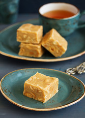 Homemade milk fudge with roasted peanuts.