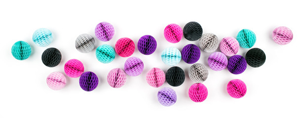 Creative arrangement frame of colorful honeycomb balls with copy space for text. isolated on white background. Flat lay, top view.