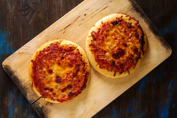 Mini margarita pizza. Italian food. Simple background. Fast food