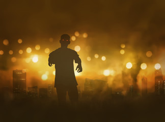 Silhouette of zombie with scary red eyes walking