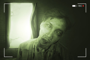 Portrait of scary asian zombie man with wounded face