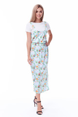 Fashion glamour sexy model beautiful woman pretty face long blond hair skin care perfect body shape white background makeup lady wear long dress style clothes for office party walk celebrity accessory