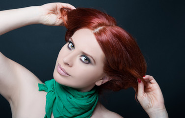 Fashion portrait of beautiful girl with red hair
