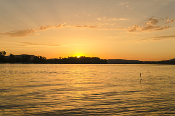 beach sunset by Danube in summer, Hungary. summer beauty sunset in July