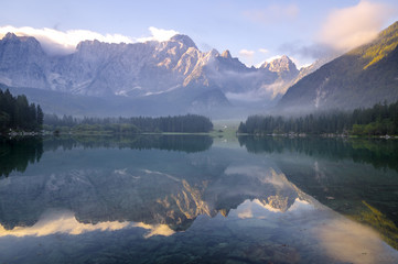 sunrise over the mountain lake in the Julian Alps in Italy