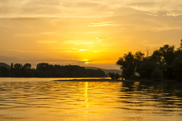 beach sunset by Danube in summer, Hungary. summer beauty sunset in July