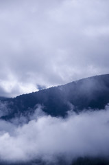 Fototapeta na wymiar Mountains in the fog